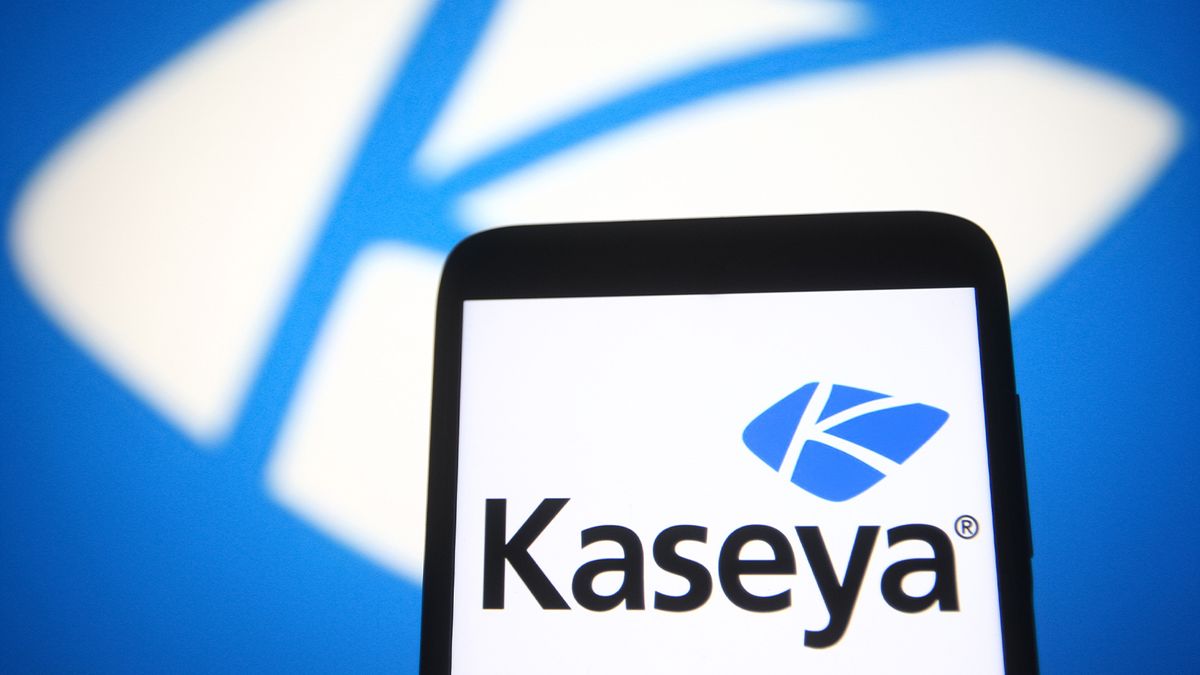 Kaseya logo displayed on a smartphone with blue and white coloring in the background.
